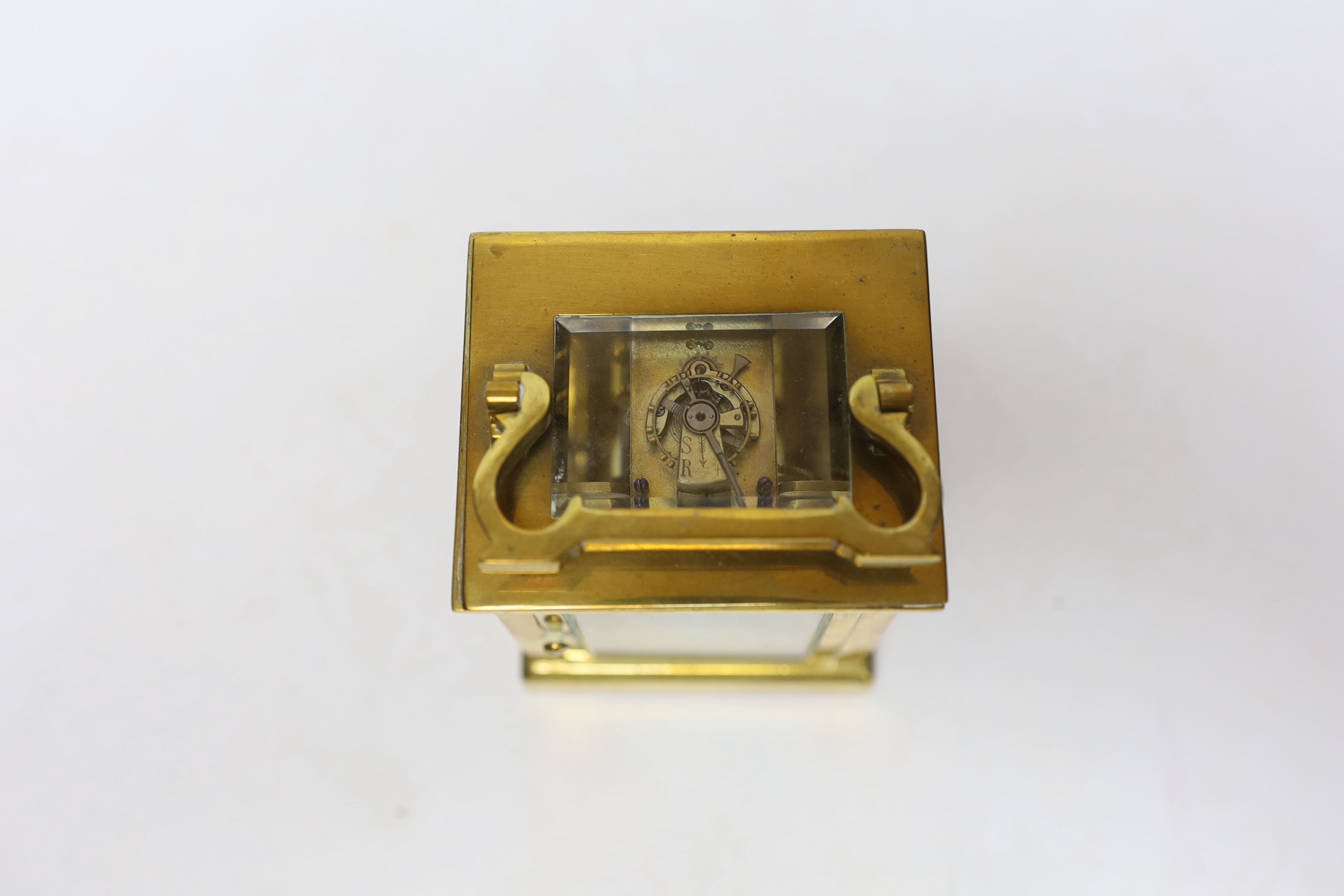 A cased brass carriage timepiece, 14cm high